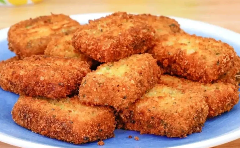 Bocconcini di patate croccanti al parmigiano e alle erbe aromatiche con pane alle erbe italiane